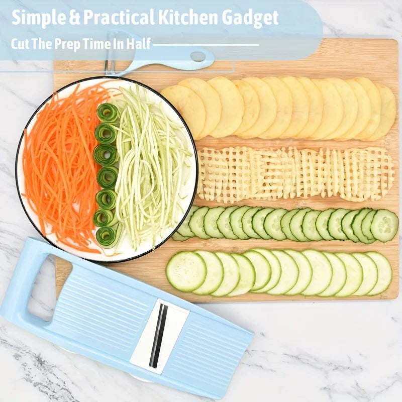 Blue compact vegetable slicer beside sliced cucumber, potato, carrot, and waffle-cut vegetables